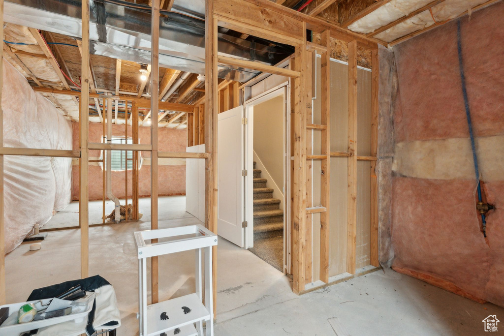 Unfinished basement with stairs