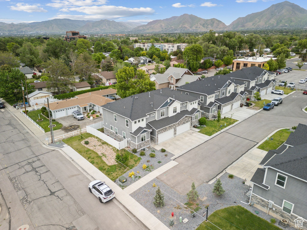 Aerial view of residential area with a mountain backdrop