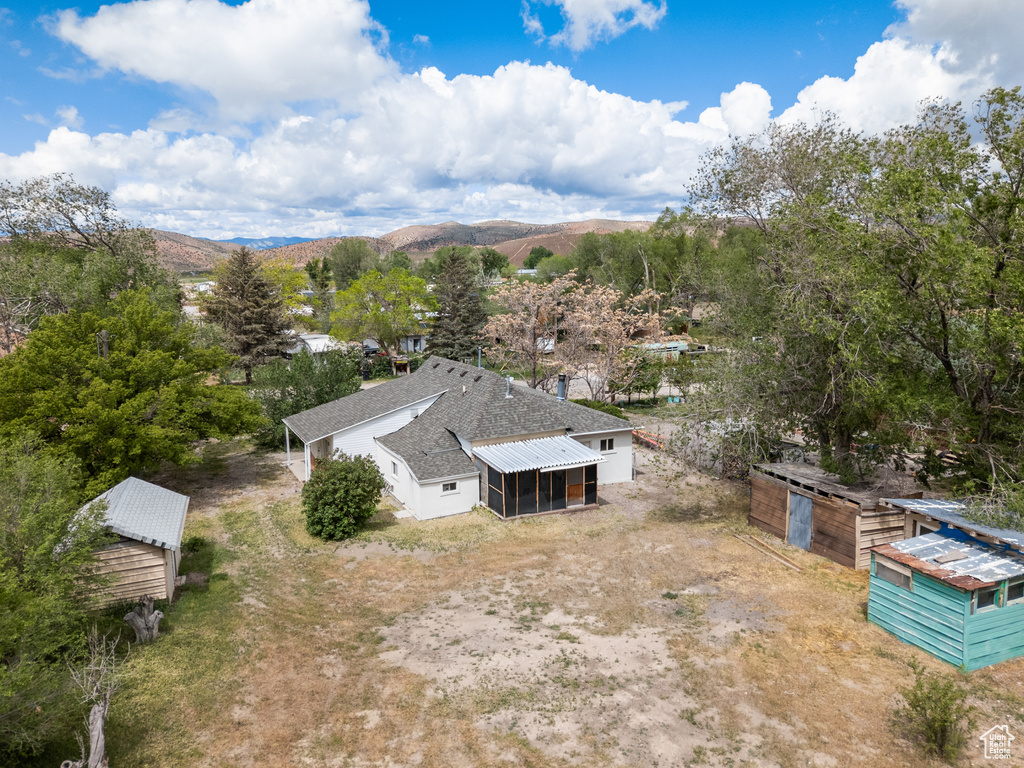 View from above of property featuring a mountain backdrop
