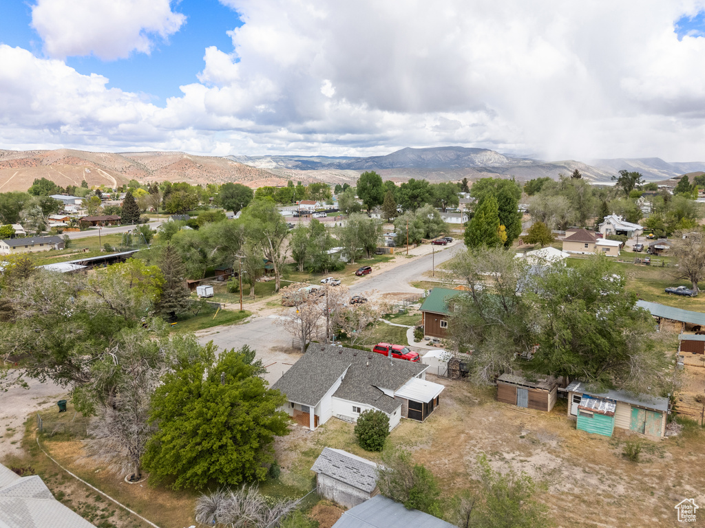 Aerial view of residential area with a mountain backdrop