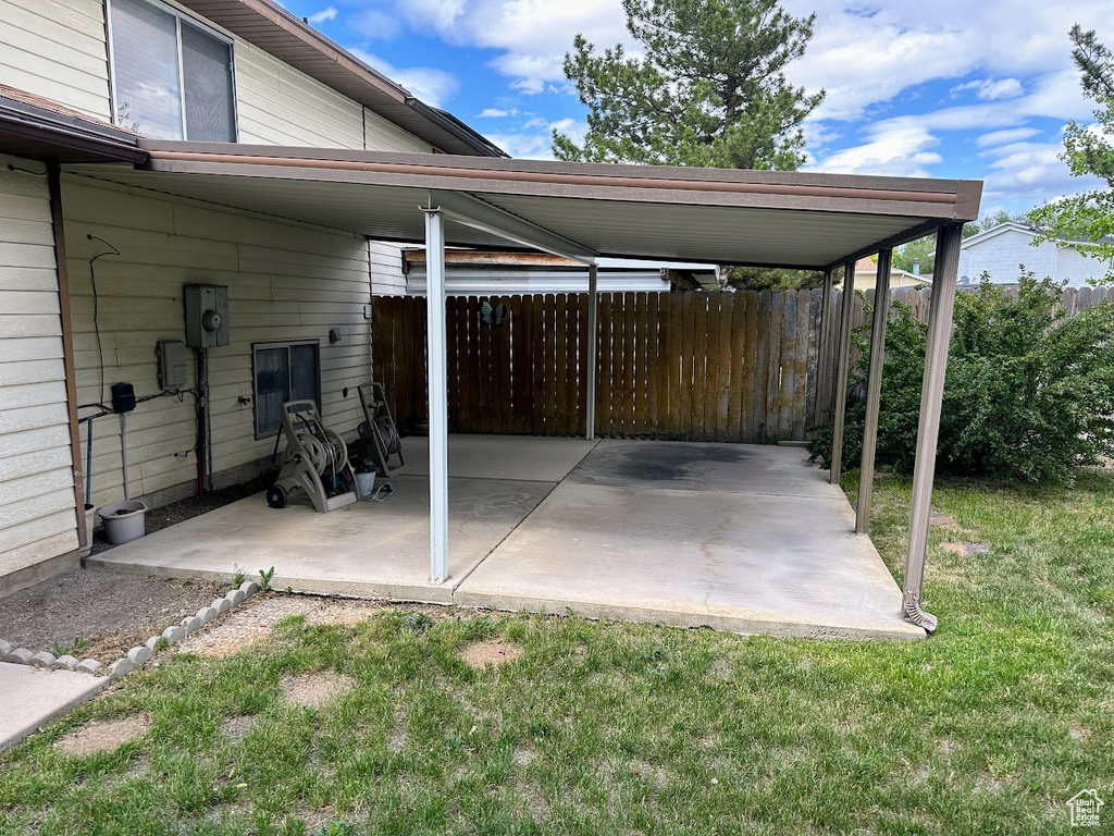 View of patio featuring a carport