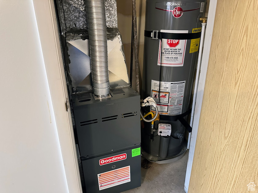 Utilities featuring strapped water heater and heating unit
