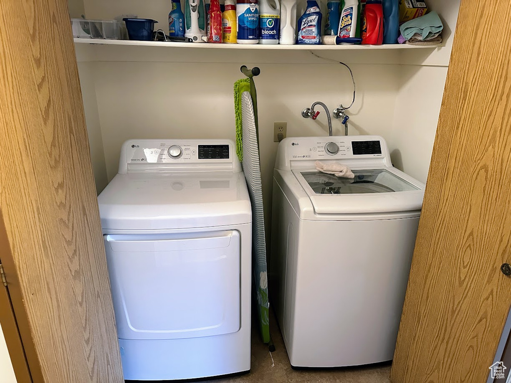 Laundry room featuring independent washer and dryer