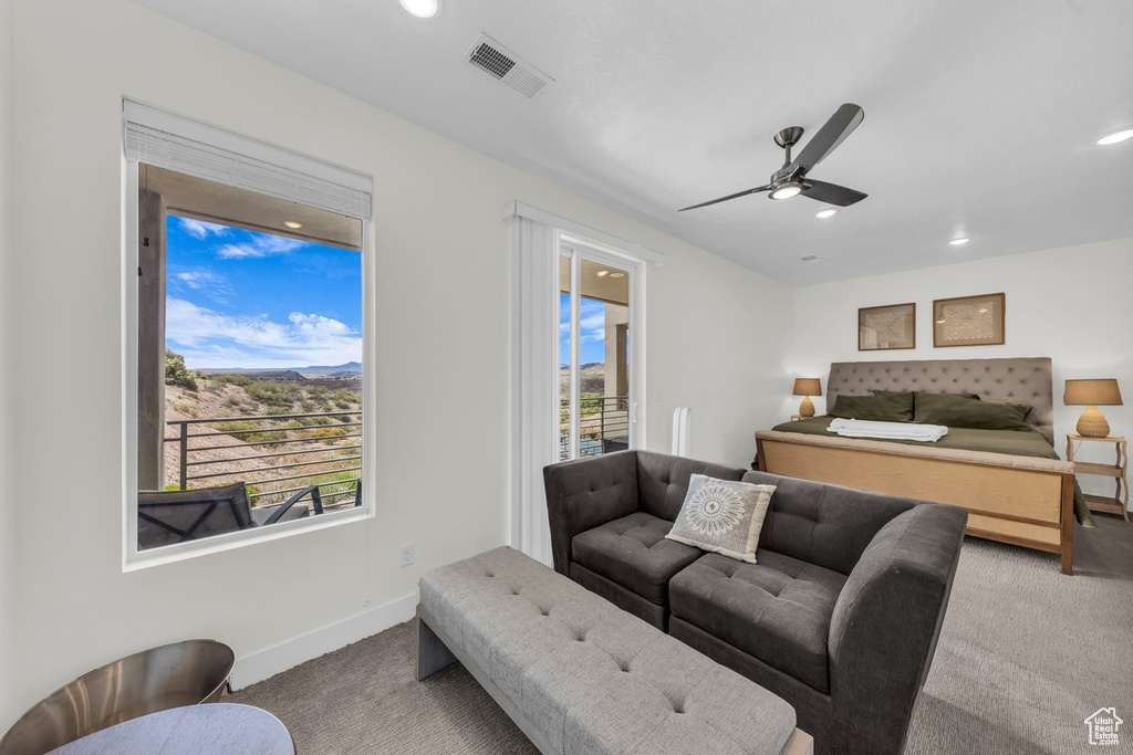 Carpeted bedroom featuring recessed lighting, baseboards, and ceiling fan