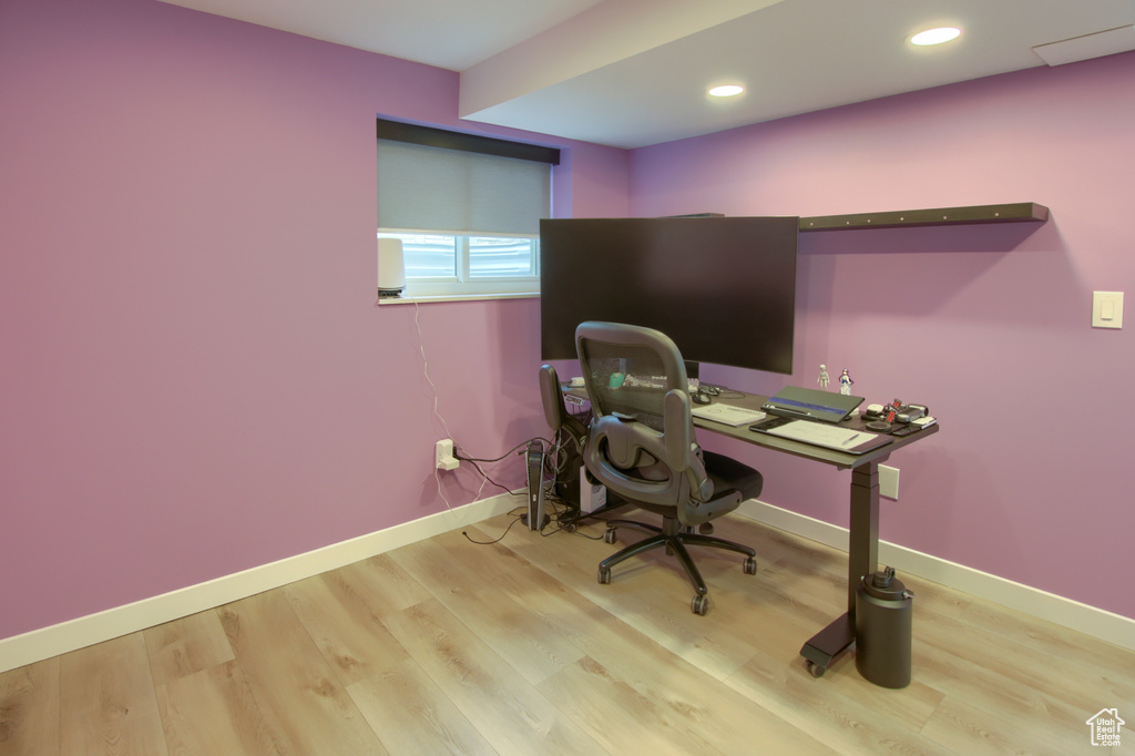 Office space with wood finished floors, baseboards, and recessed lighting