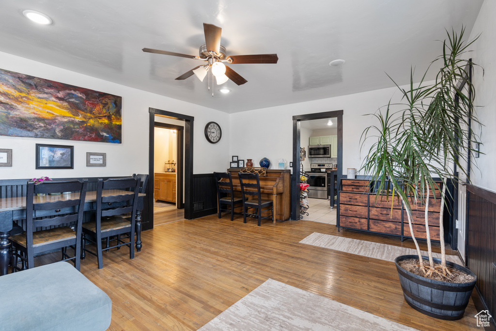 Office area featuring ceiling fan, light wood-type flooring, and recessed lighting