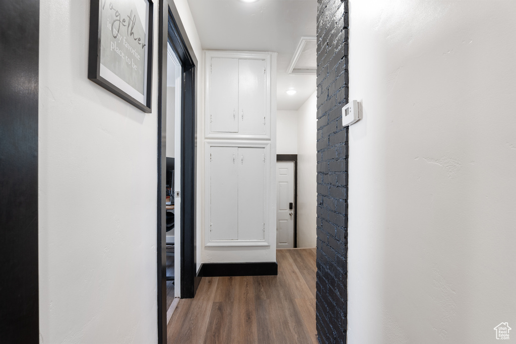 Hall with wood finished floors