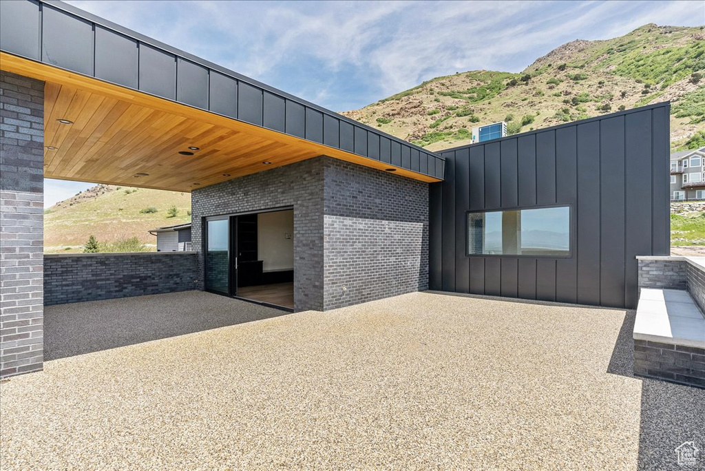 View of patio / terrace featuring a mountain view
