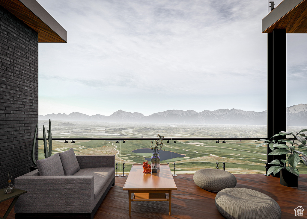 Wooden terrace with a mountain view and an outdoor hangout area