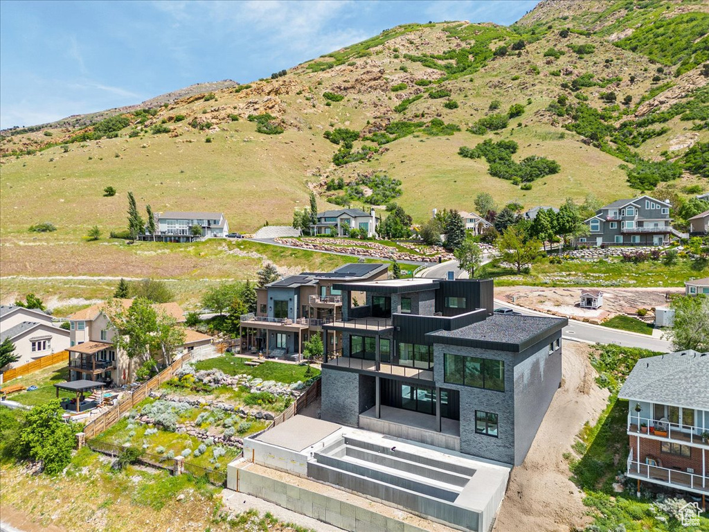 Aerial view of residential area with mountains