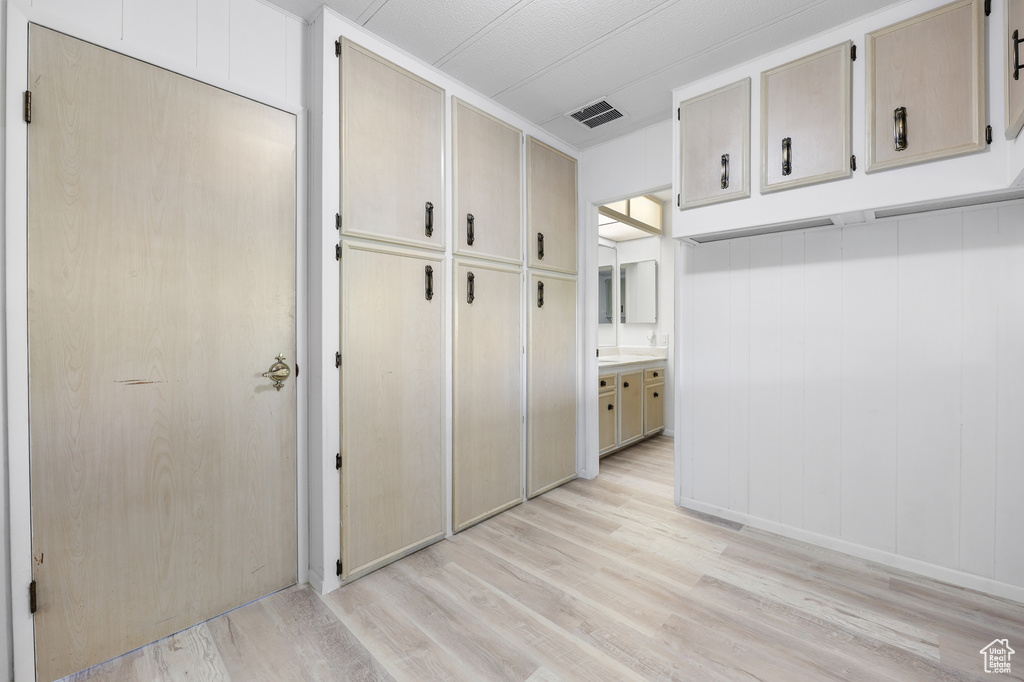 Mudroom with light wood-type flooring