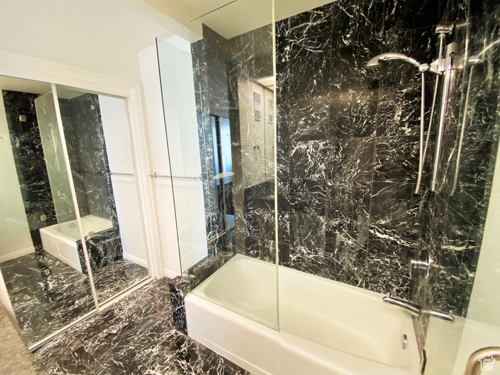 Bathroom featuring marble tiled flooring