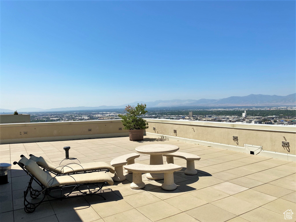 View of patio / terrace with a mountain view