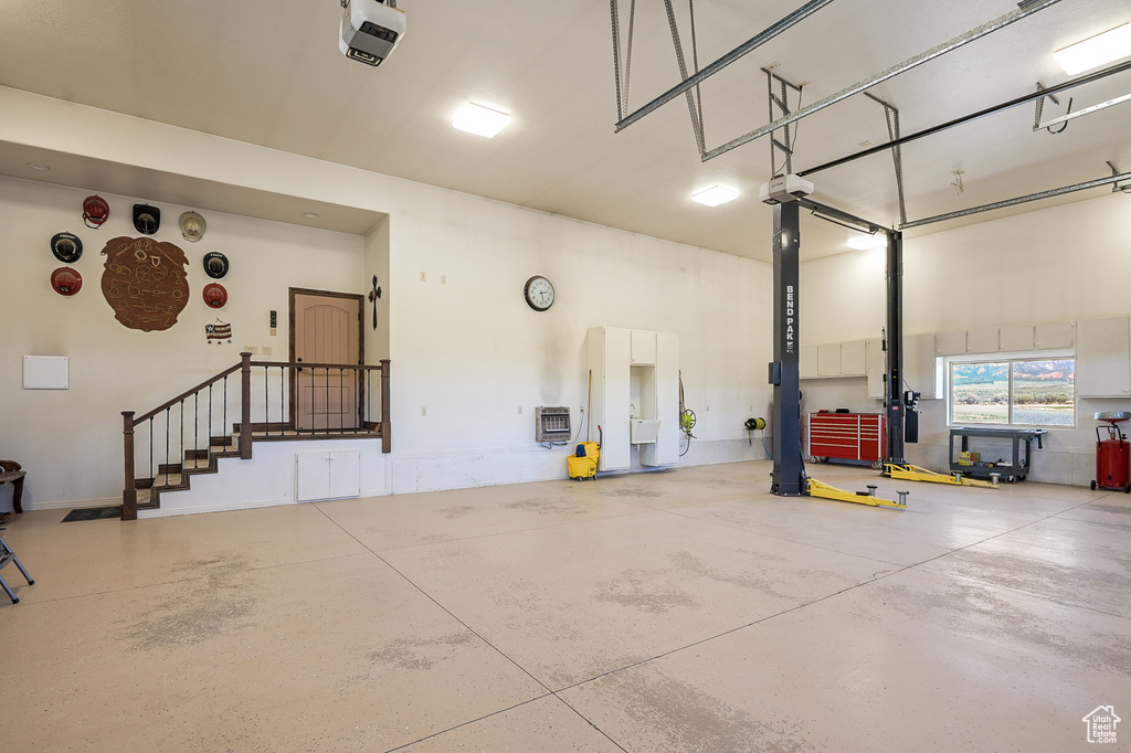 Garage with a garage door opener and heating unit