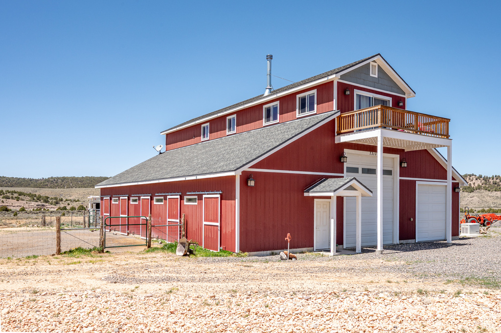View of outdoor structure with fence