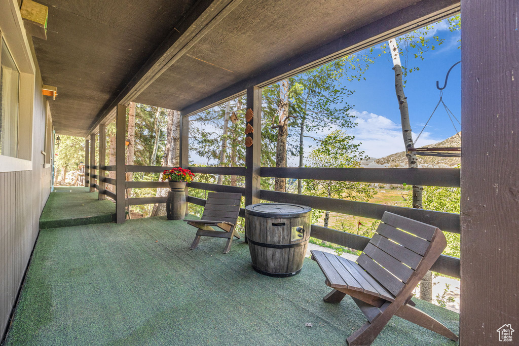 Sunroom featuring healthy amount of natural light