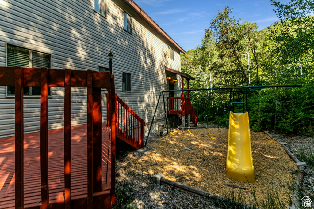 View of yard with a deck