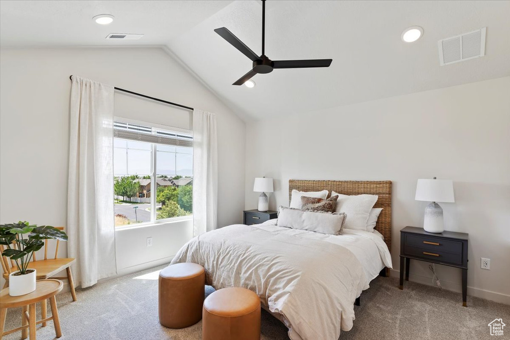 Bedroom featuring carpet flooring, lofted ceiling, a ceiling fan, and recessed lighting