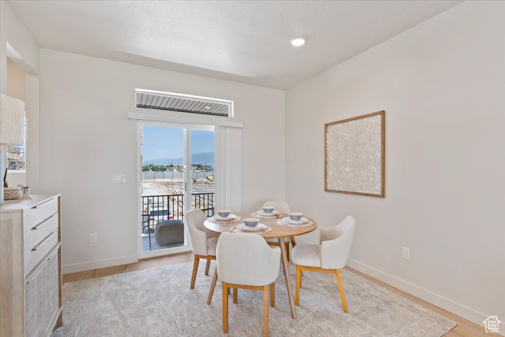 Dining area featuring light wood-style flooring