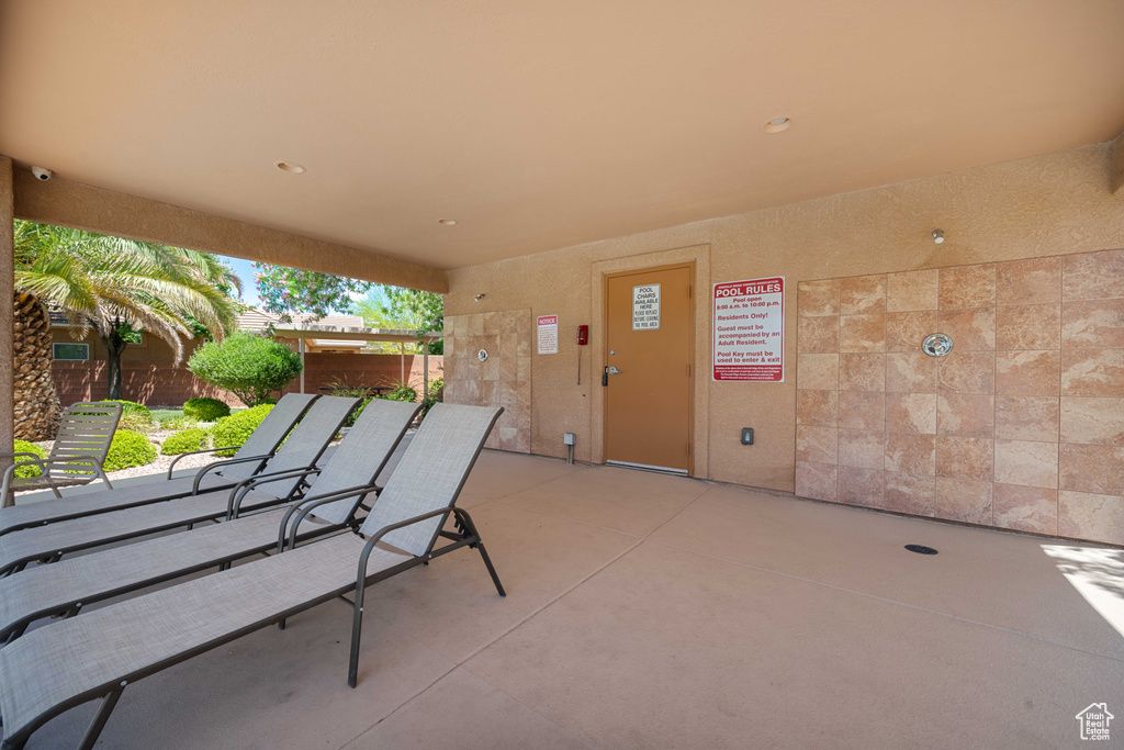 View of patio with fence