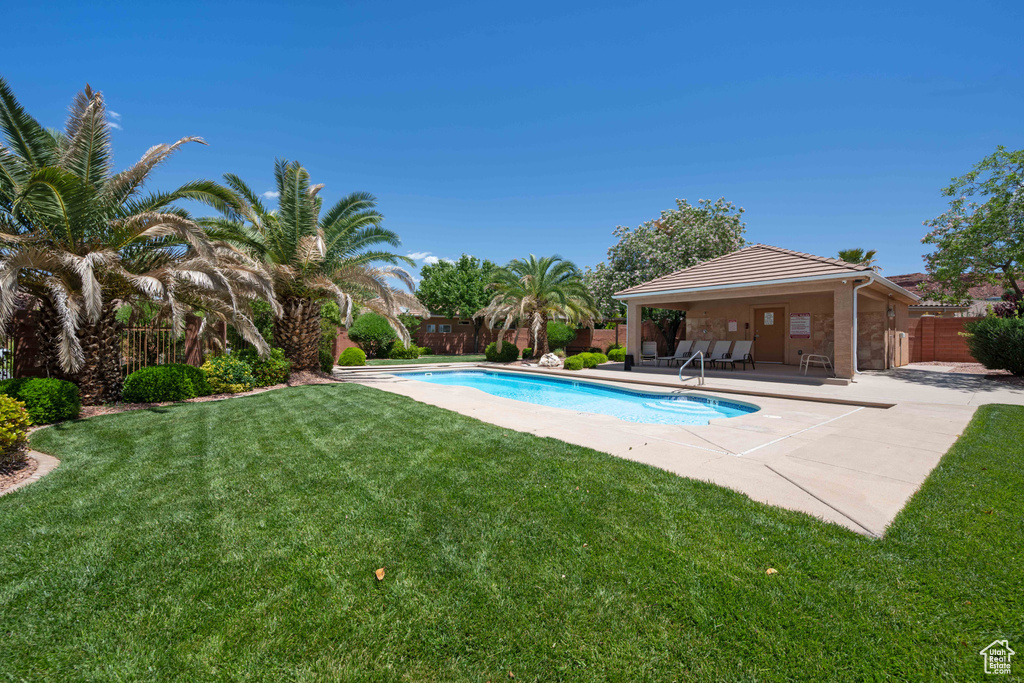 View of swimming pool featuring a patio