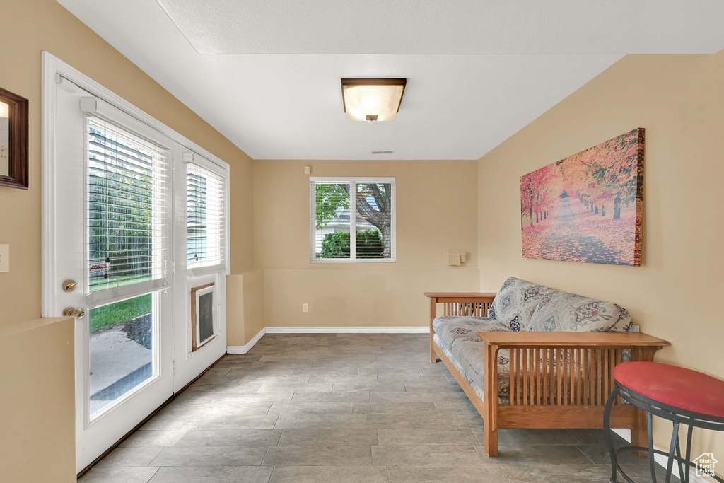 Living area featuring baseboards