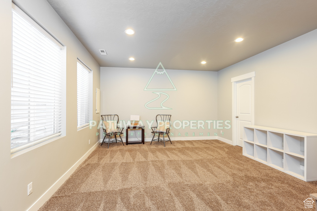 Unfurnished room featuring carpet floors, recessed lighting, and baseboards