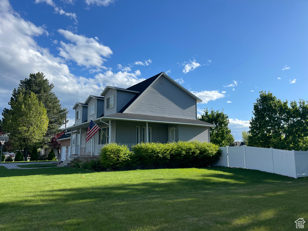 View of home\'s exterior featuring roof with shingles
