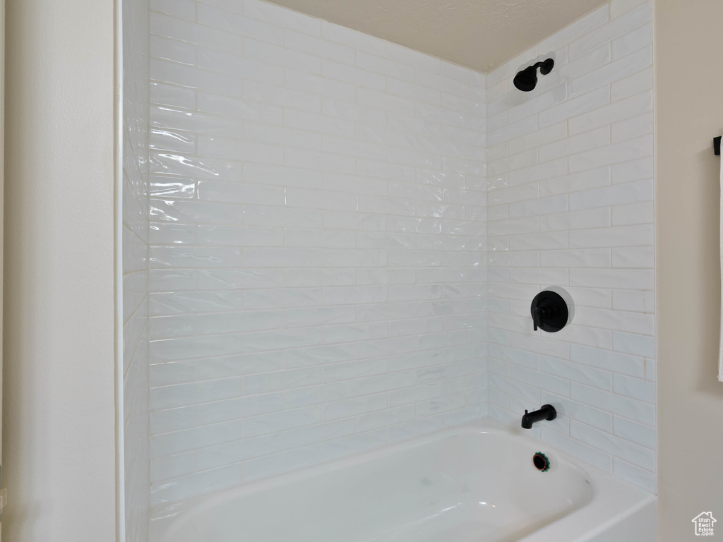 Bathroom featuring shower / bathtub combination