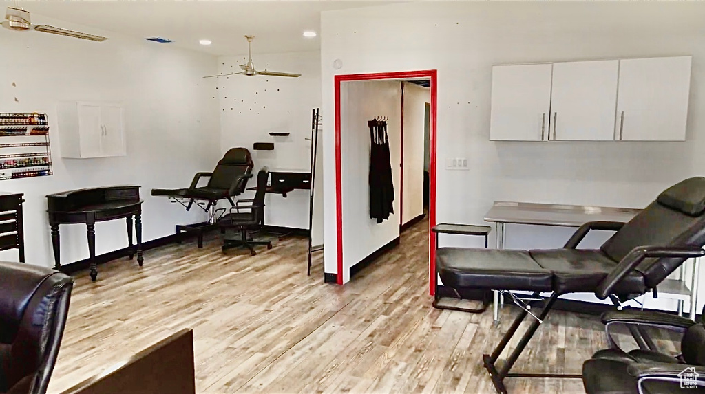 Interior space with light wood-style floors, recessed lighting, ceiling fan, and baseboards