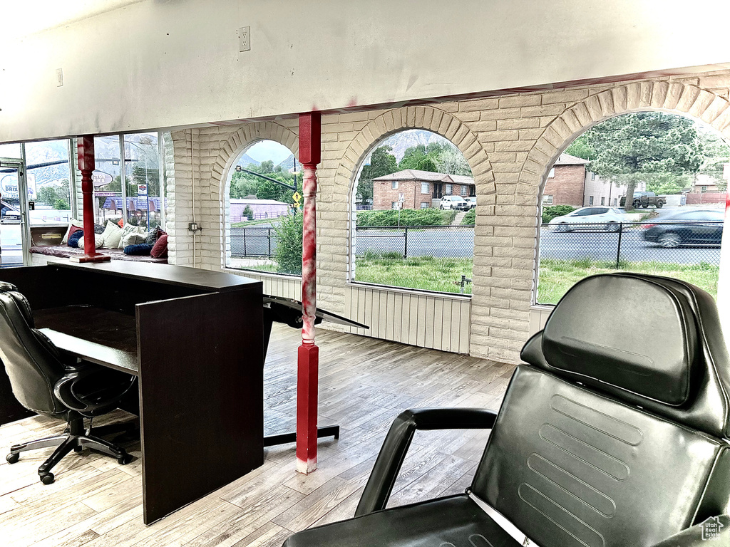 Office area featuring wood finished floors