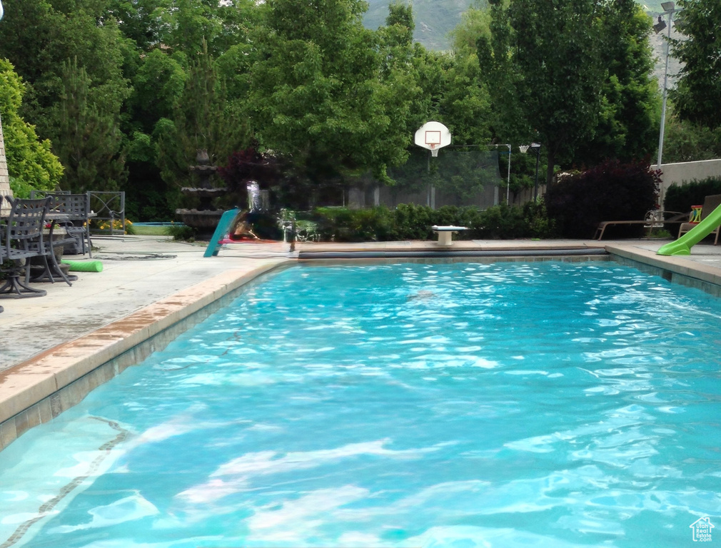 Swimming pool featuring a patio area