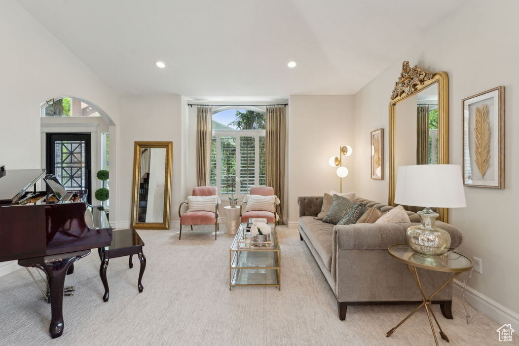 Living area featuring baseboards and recessed lighting