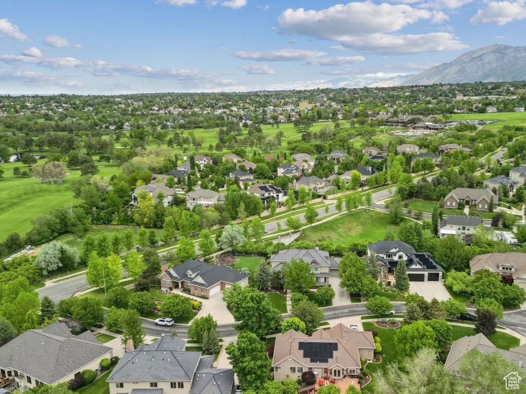 Aerial view of residential area with a mountain backdrop