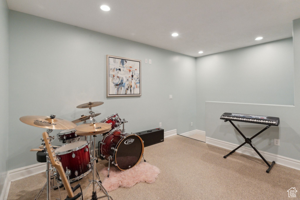 Miscellaneous room with recessed lighting, baseboards, and carpet flooring