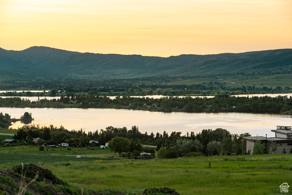 View of mountain backdrop with a nearby body of water