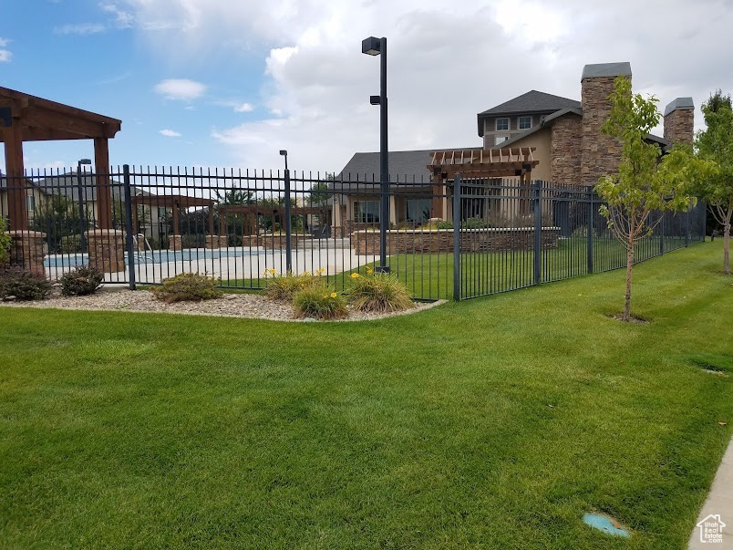 View of yard with a pergola