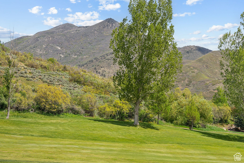 View of mountain background with a golf course