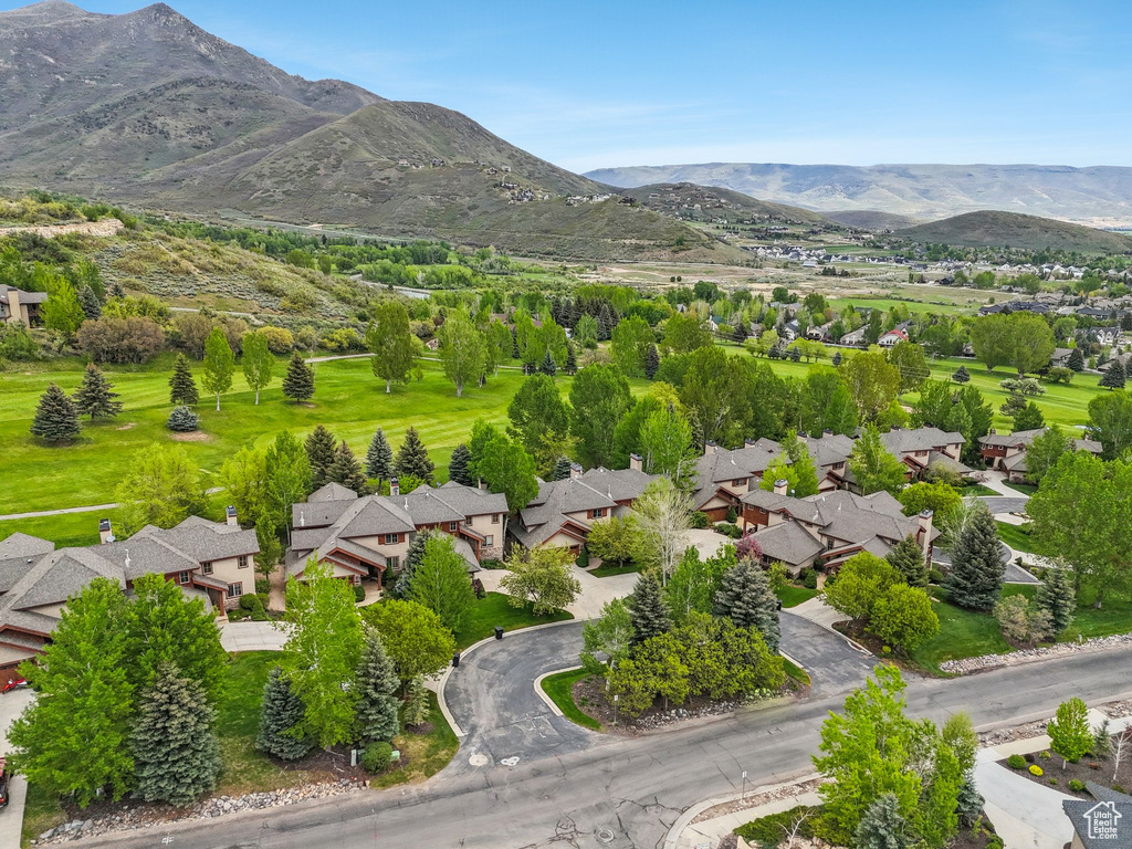 Aerial view of residential area featuring mountains