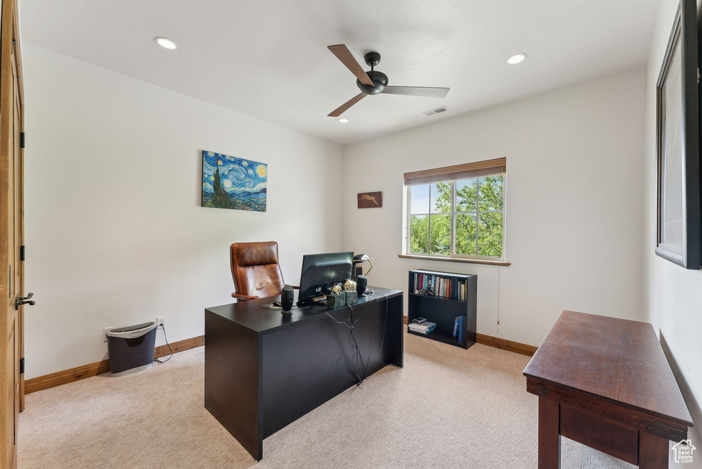 Home office with light carpet, a ceiling fan, recessed lighting, and baseboards