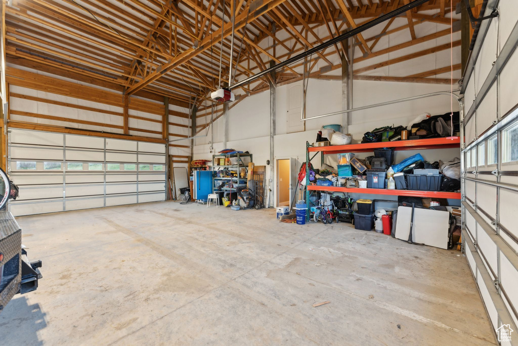 Garage featuring a garage door opener
