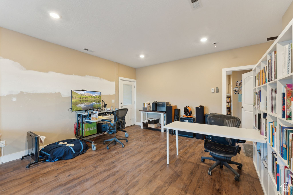 Home office with wood finished floors, recessed lighting, and baseboards