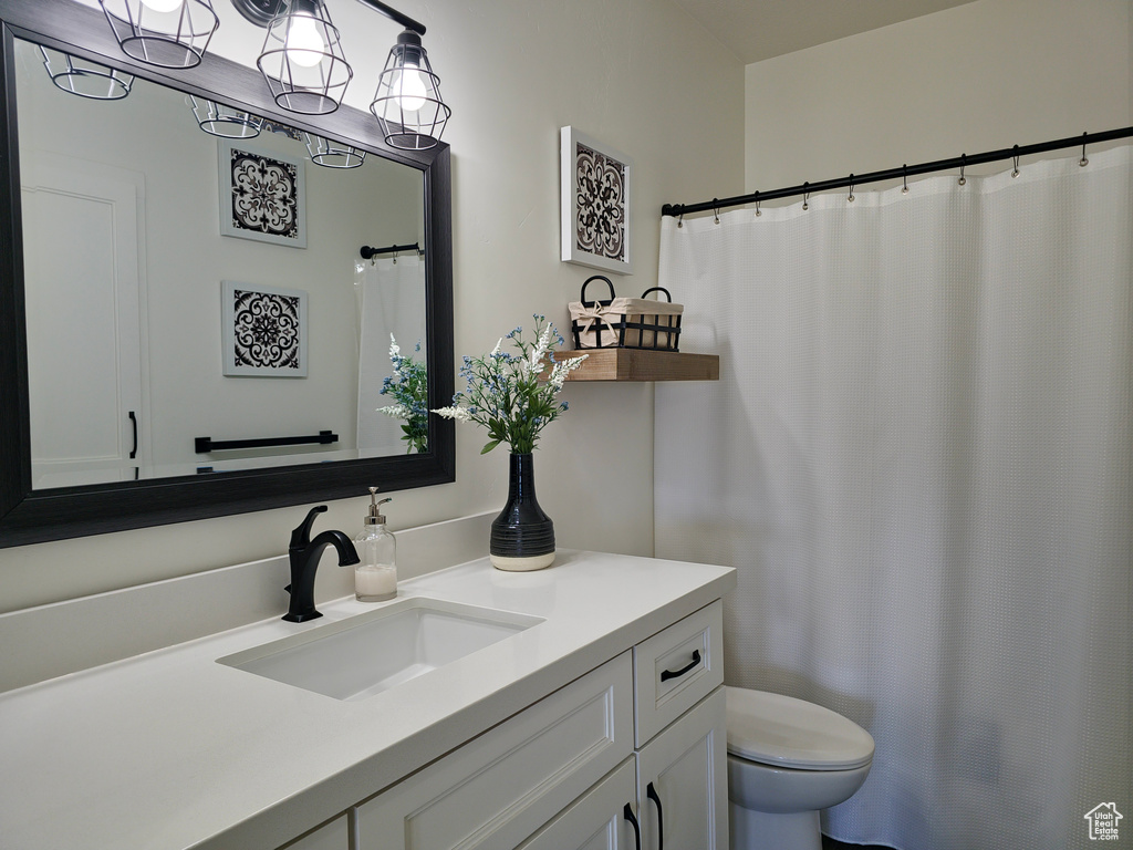 Bathroom featuring toilet and vanity