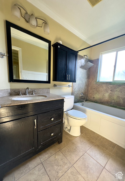 Bathroom with shower / bathtub combination, tile patterned flooring, ornamental molding, and vanity