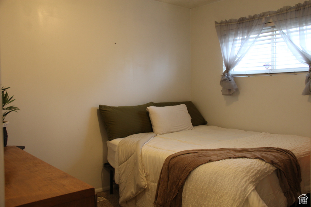Bedroom with carpet flooring