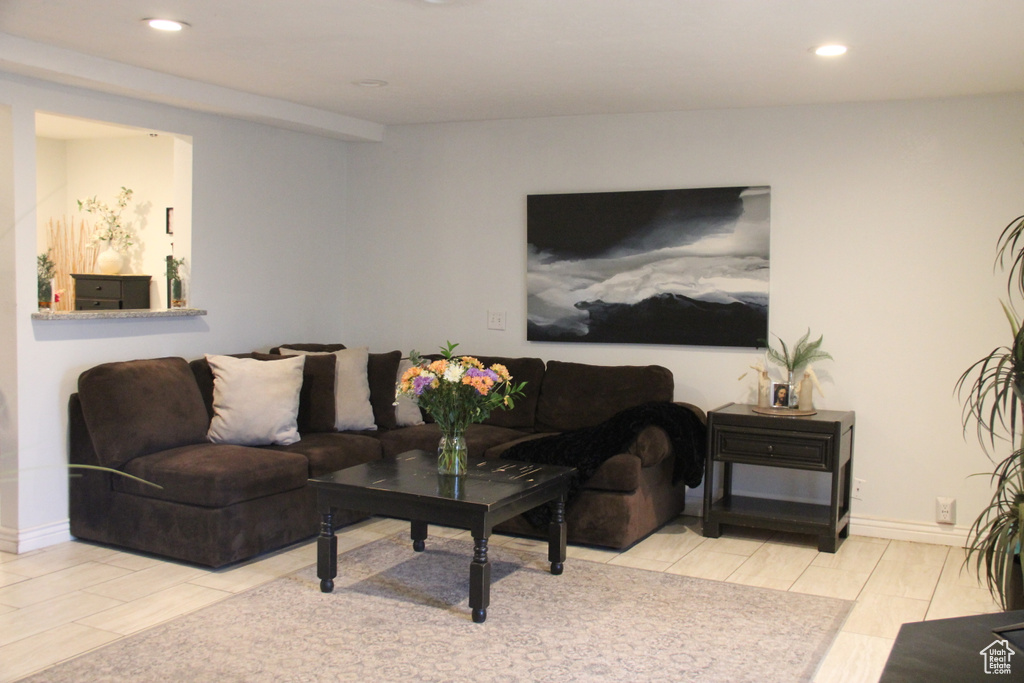 Living room featuring recessed lighting and baseboards