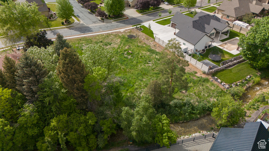 Aerial overview of property\'s location with nearby suburban area