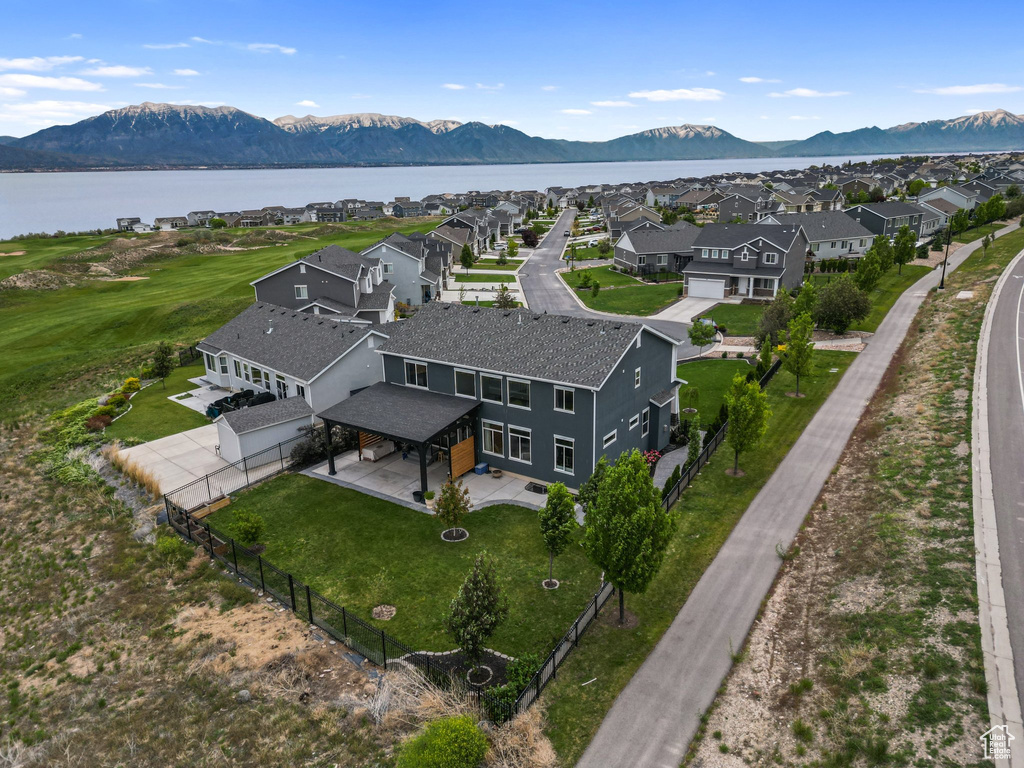 Aerial view of residential area with a water and mountain view