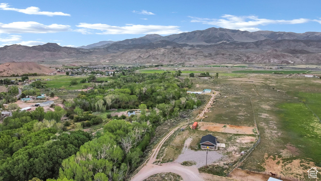 View of property location with a mountain backdrop and rural landscape
