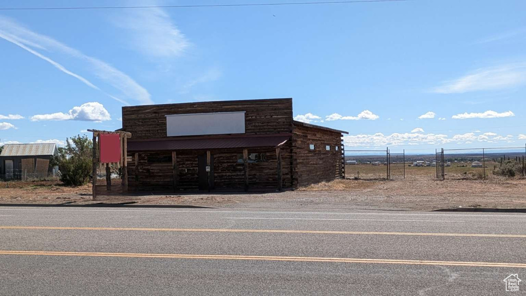 View of building exterior with fence